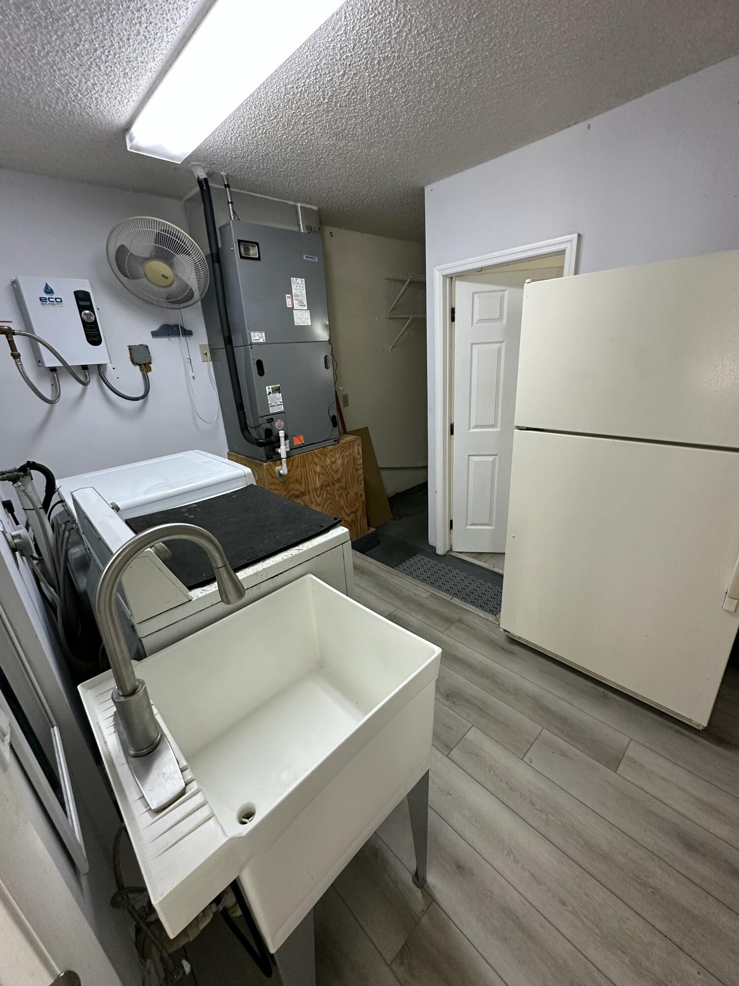 3291 Southwest 4th Street Deerfield Beach, FL 33442 - Photo 26 of 38 a living room with furniture and a table