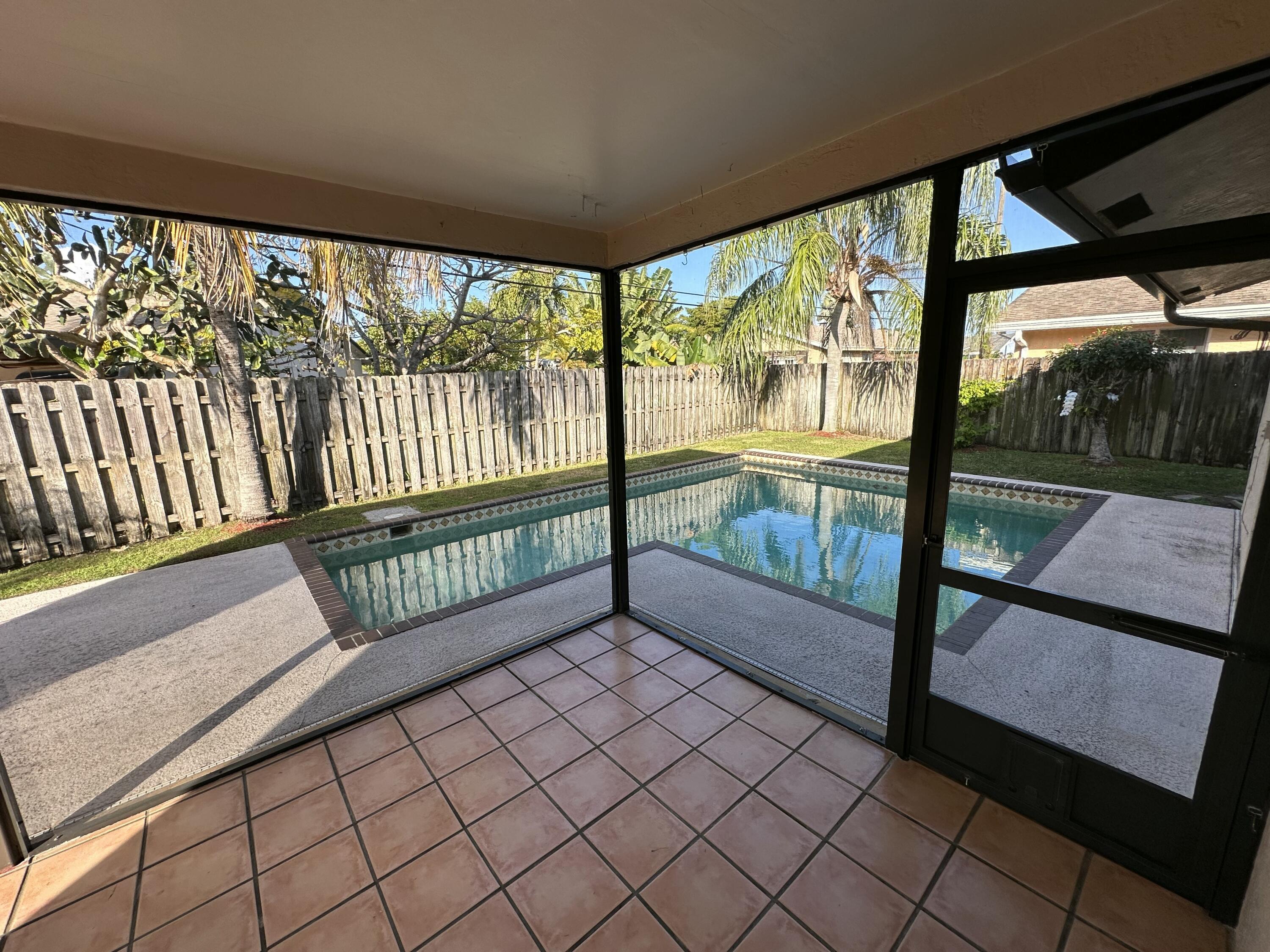 3291 Southwest 4th Street Deerfield Beach, FL 33442 - Photo 32 of 38 a view of a porch