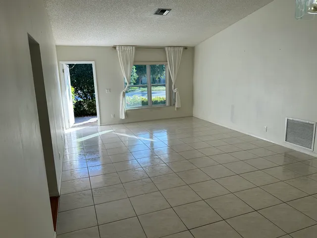 an empty room and entrance