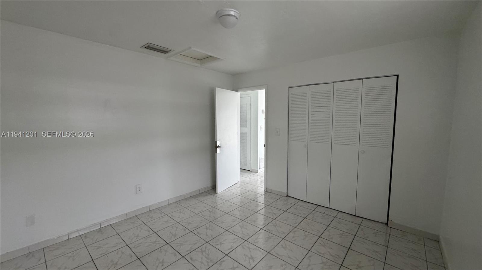 7235 Southwest 23rd Street, Unit 7235 Miami, FL 33155 - Photo 9 of 15 a view of an empty room