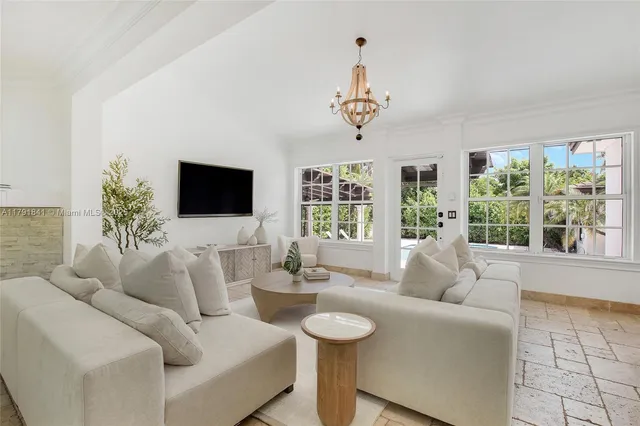 a view of kitchen with furniture and a fireplace
