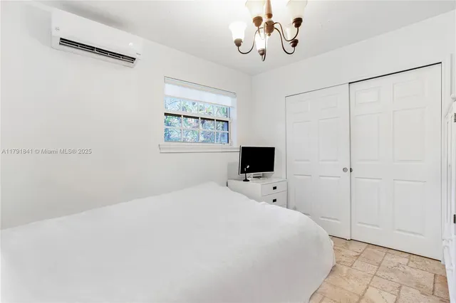 a view of a backyard with sitting area