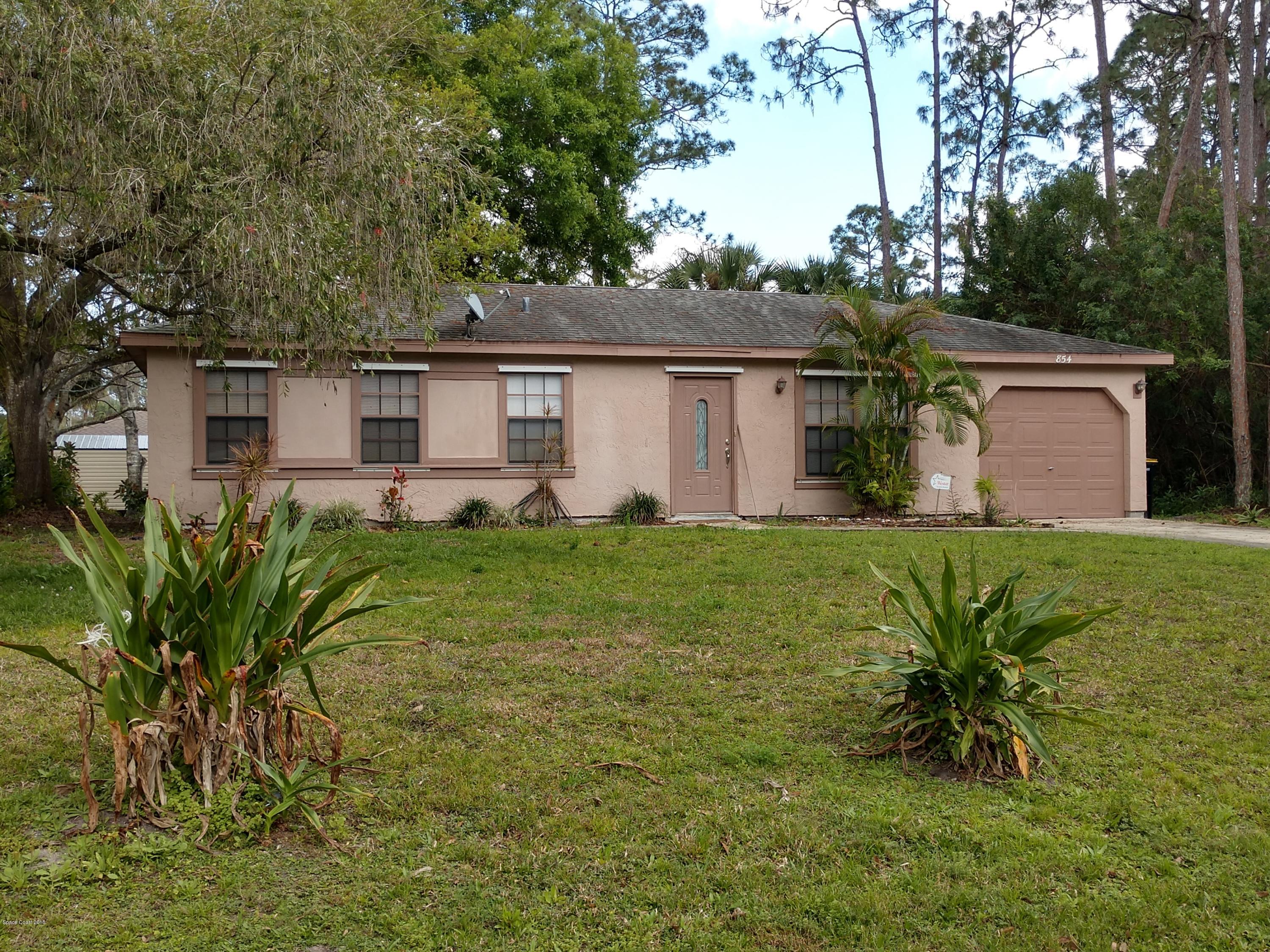 854 Angelico Road Northwest Palm Bay, FL 32907 - Photo 1 of 13 Front View