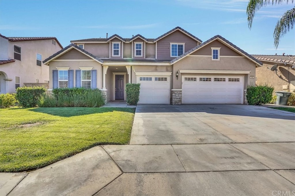 1487 Adderstone Way Perris, CA 92571 - Photo 1 of 1 a front view of a house with garden
