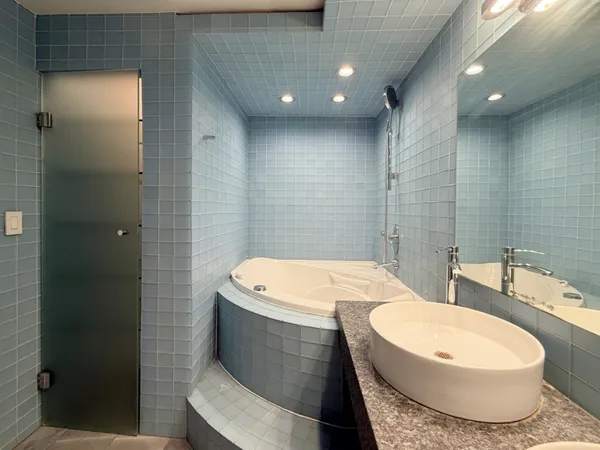 a bathroom with a sink and toilet