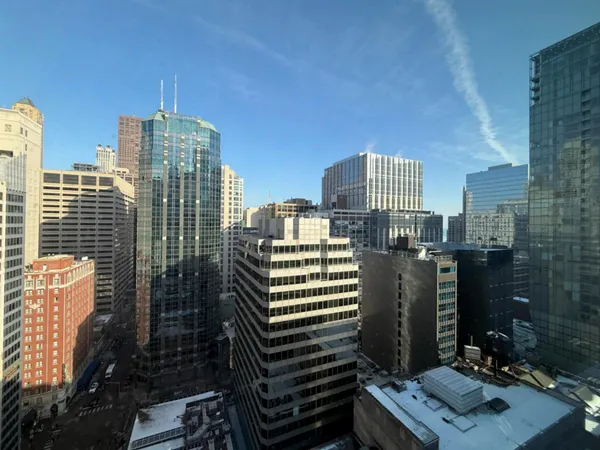 a view of a city with tall buildings