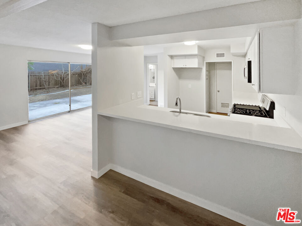 443 Pepper Tree Drive Brea, CA 92821 - Photo 17 of 26 a bathroom with a sink and a mirror