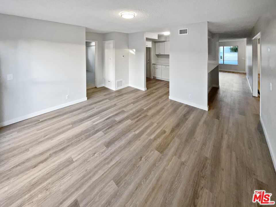 443 Pepper Tree Drive Brea, CA 92821 - Photo 19 of 26 a view of empty room with wooden floor