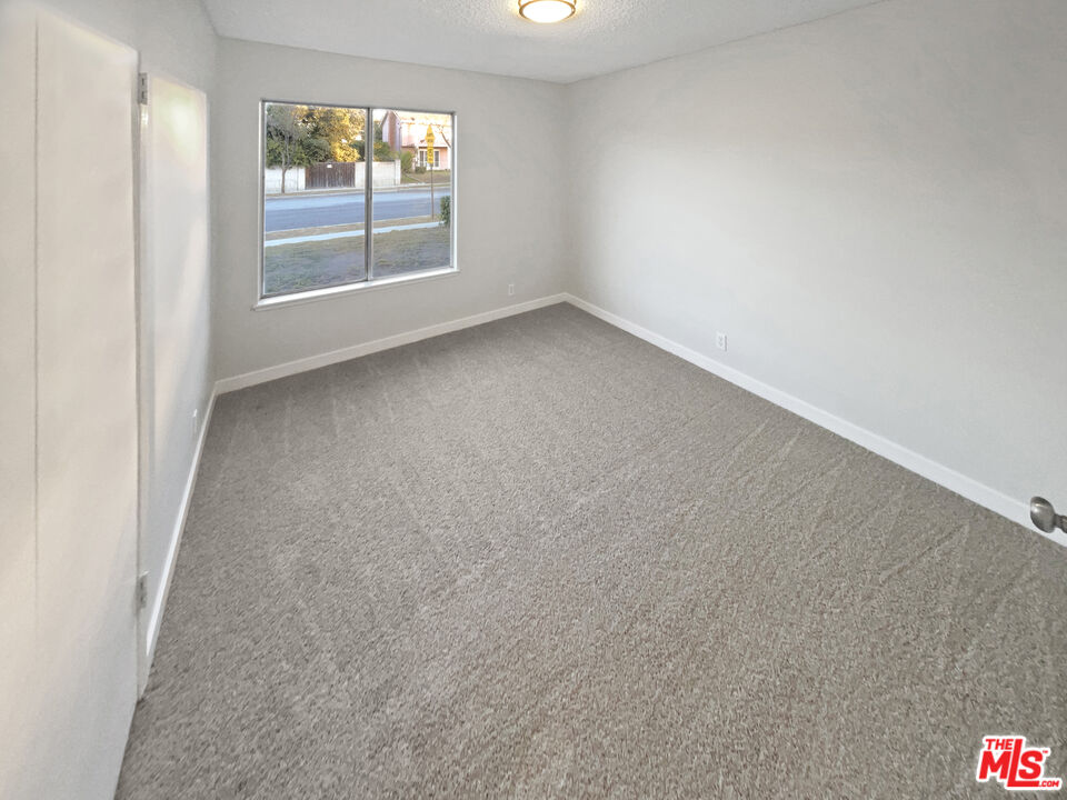 443 Pepper Tree Drive Brea, CA 92821 - Photo 5 of 26 an empty room with windows