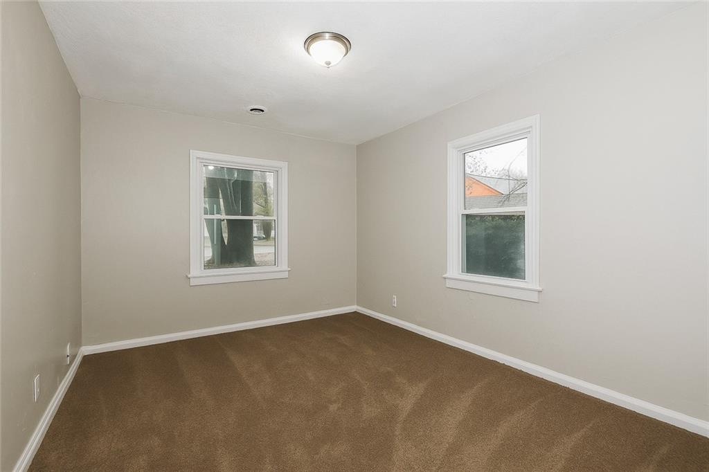 1944 Washington Road East Point, GA 30344 - Photo 11 of 14 an empty room with windows