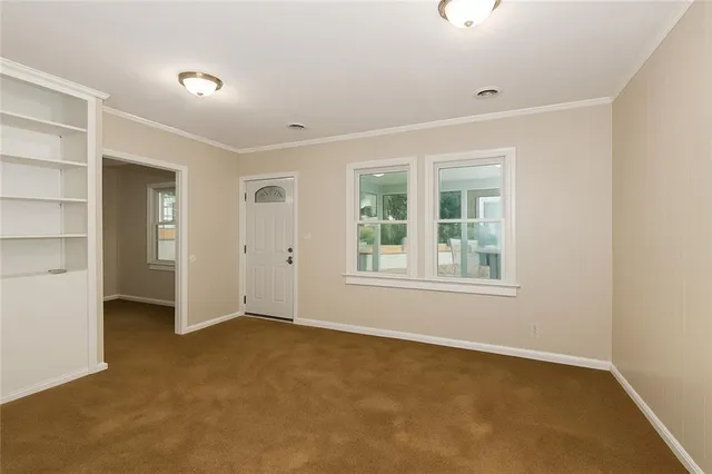 an empty room with windows