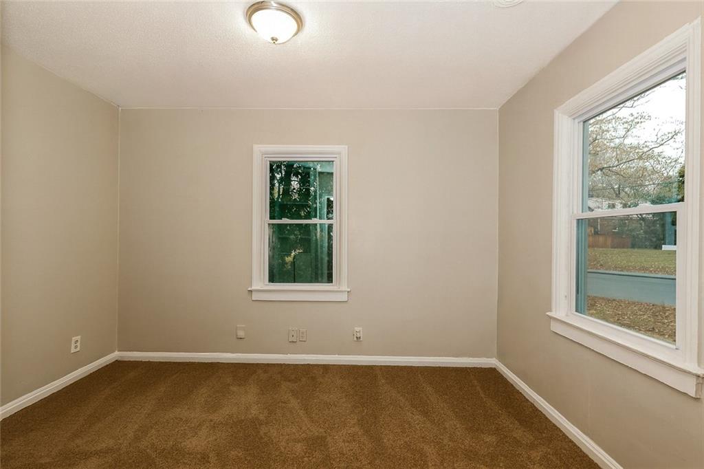 1944 Washington Road East Point, GA 30344 - Photo 3 of 14 an empty room with window