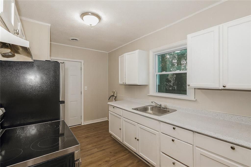 1944 Washington Road East Point, GA 30344 - Photo 6 of 14 a kitchen with a sink and cabinets