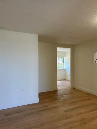 a view of an empty room and window