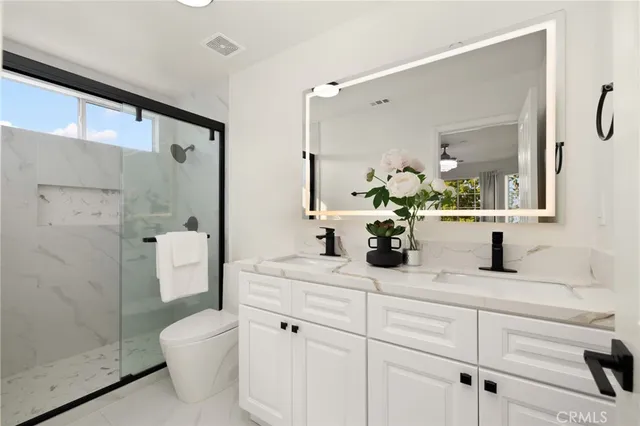 a view of a hallway with windows