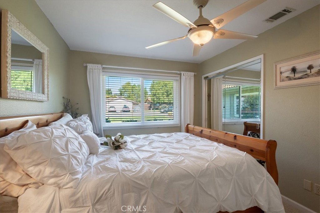 1321 June Street Fallbrook, CA 92028 - Photo 24 of 44 a bed sitting in a bedroom next to a window