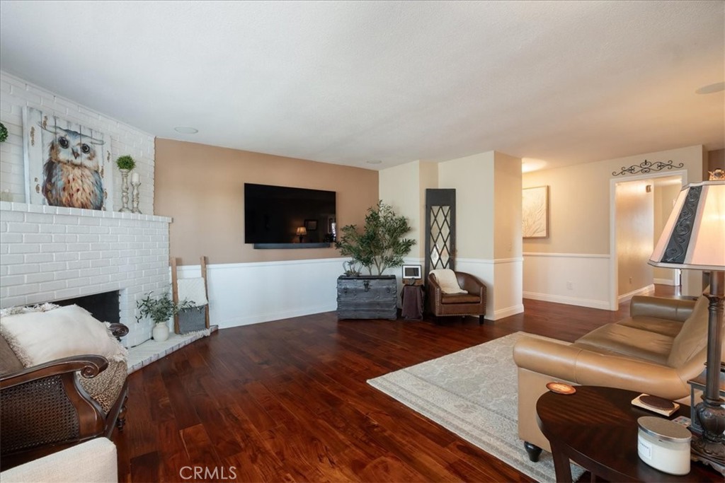1321 June Street Fallbrook, CA 92028 - Photo 9 of 44 a living room with furniture and a flat screen tv