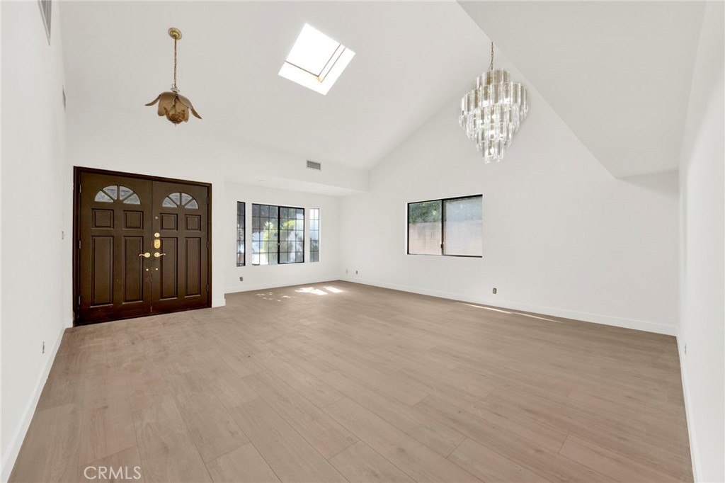 20243 Lanark Street Winnetka, CA 91306 - Photo 3 of 38 a view of empty room with windows