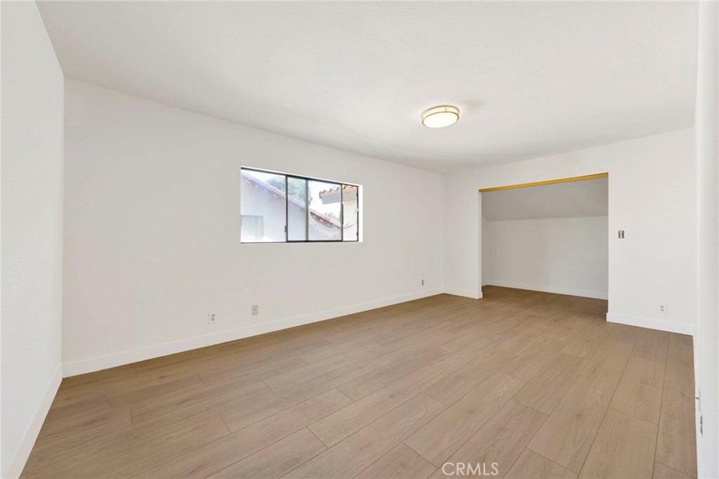 20243 Lanark Street Winnetka, CA 91306 - Photo 32 of 38 an empty room with windows