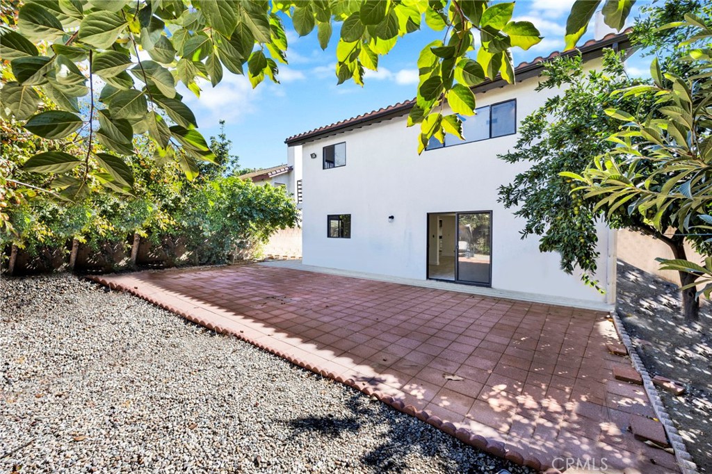 20243 Lanark Street Winnetka, CA 91306 - Photo 33 of 38 a view of a house with a tree
