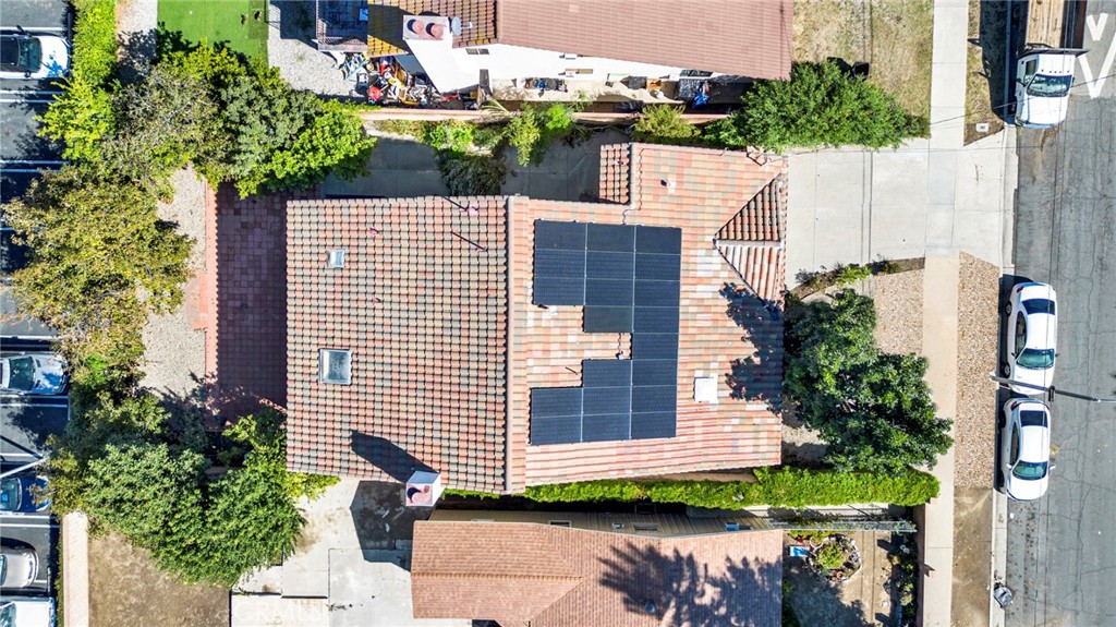 20243 Lanark Street Winnetka, CA 91306 - Photo 37 of 38 a view of a patio with plants and large trees