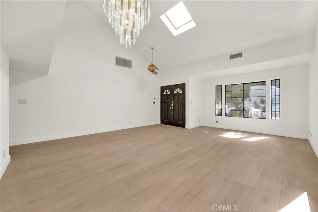 20243 Lanark Street Winnetka, CA 91306 - Photo 4 of 38 an empty room with windows