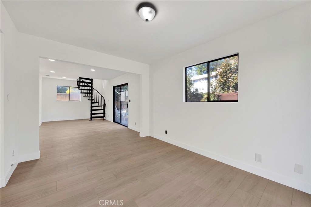 20243 Lanark Street Winnetka, CA 91306 - Photo 7 of 38 a view of empty room with windows