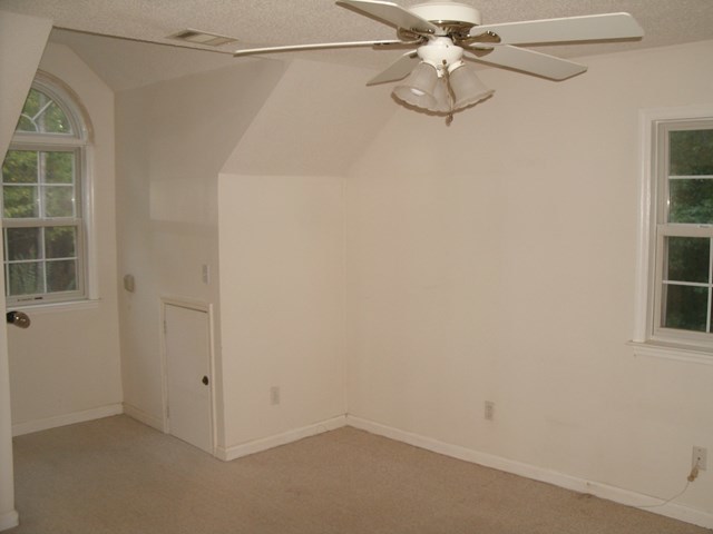 199 Cyler Road Gray, GA 31032 - Photo 13 of 23 a view of a small space with racks on the wall and a window