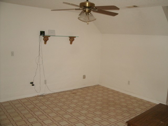 199 Cyler Road Gray, GA 31032 - Photo 16 of 23 a view of a room with racks on the wall