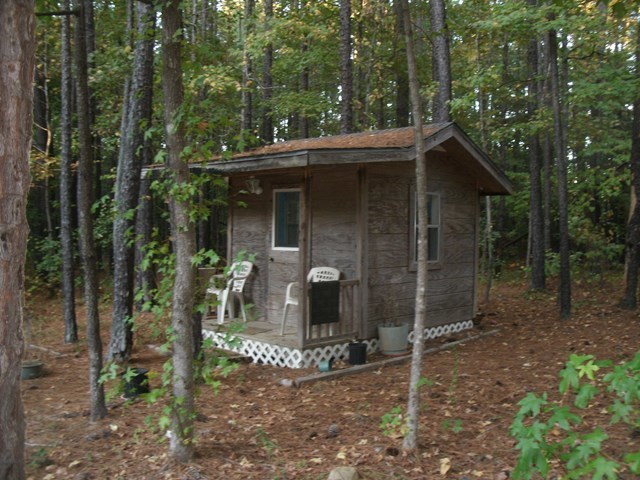 199 Cyler Road Gray, GA 31032 - Photo 22 of 23 a view of house with trees in the background