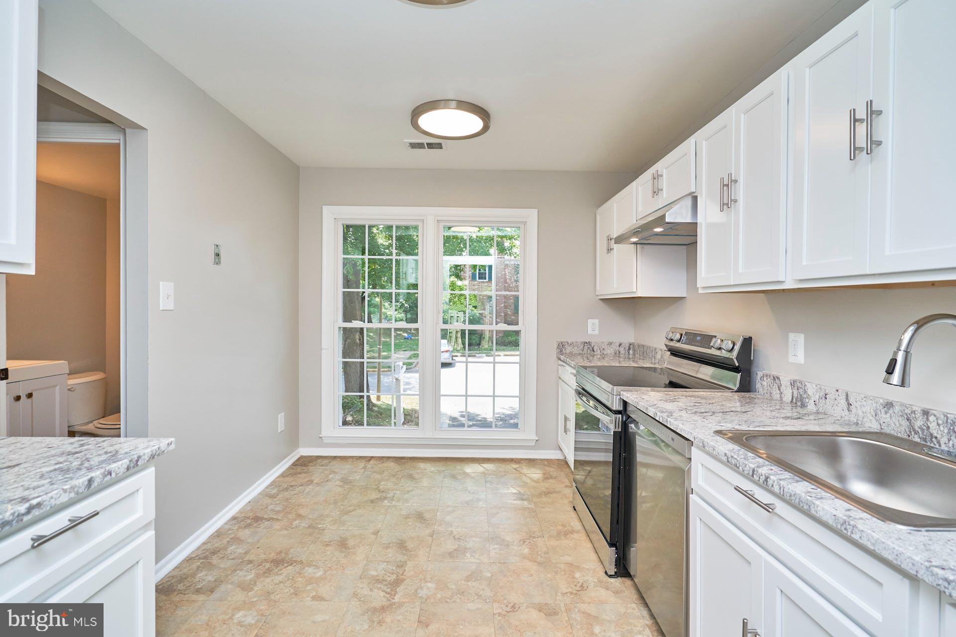 7708 Brandeis Way Springfield, VA 22153 - Photo 12 of 32 Remodeled kitchen