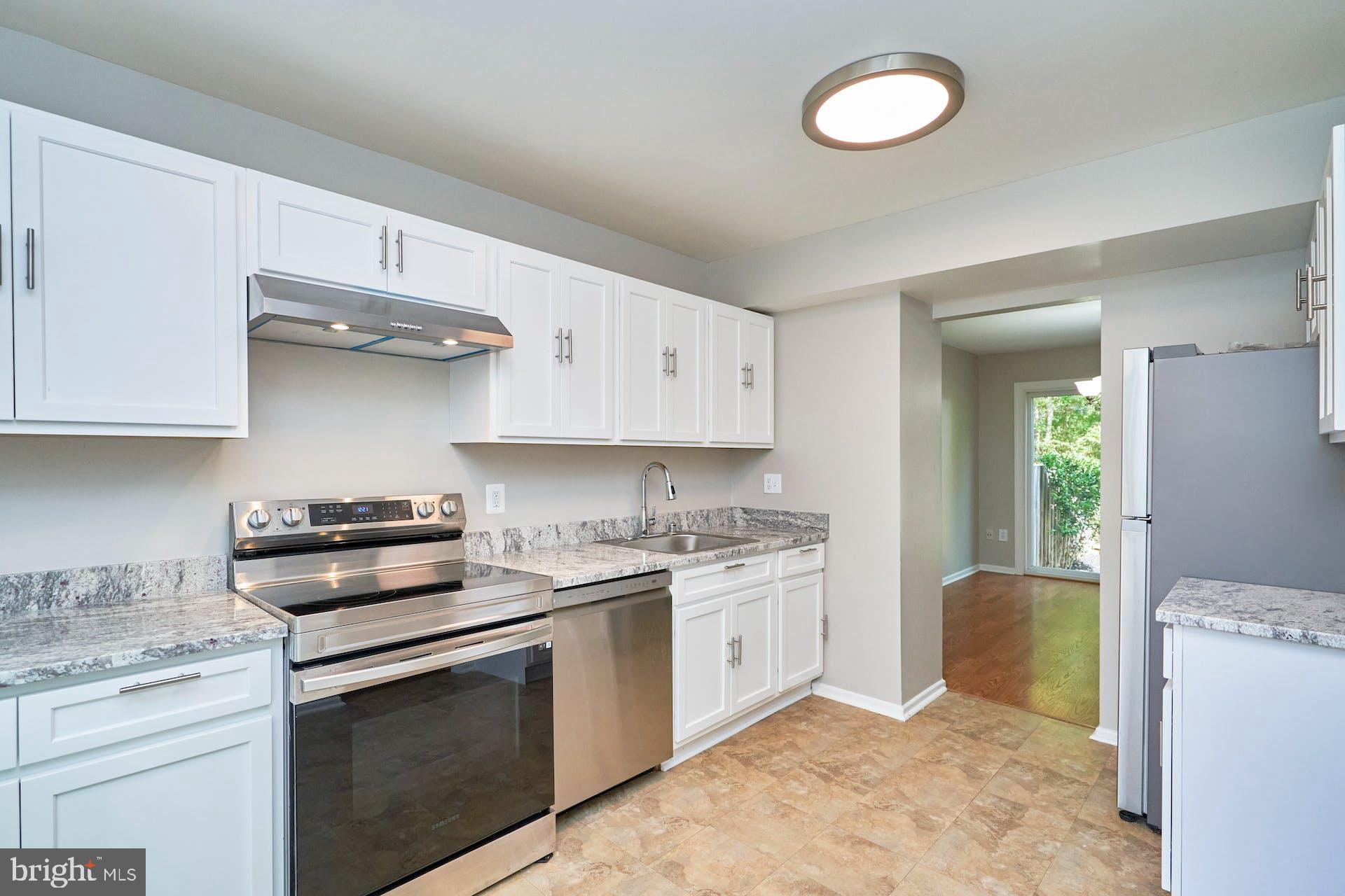 7708 Brandeis Way Springfield, VA 22153 - Photo 14 of 32 New cabinets, granite counters, appliances