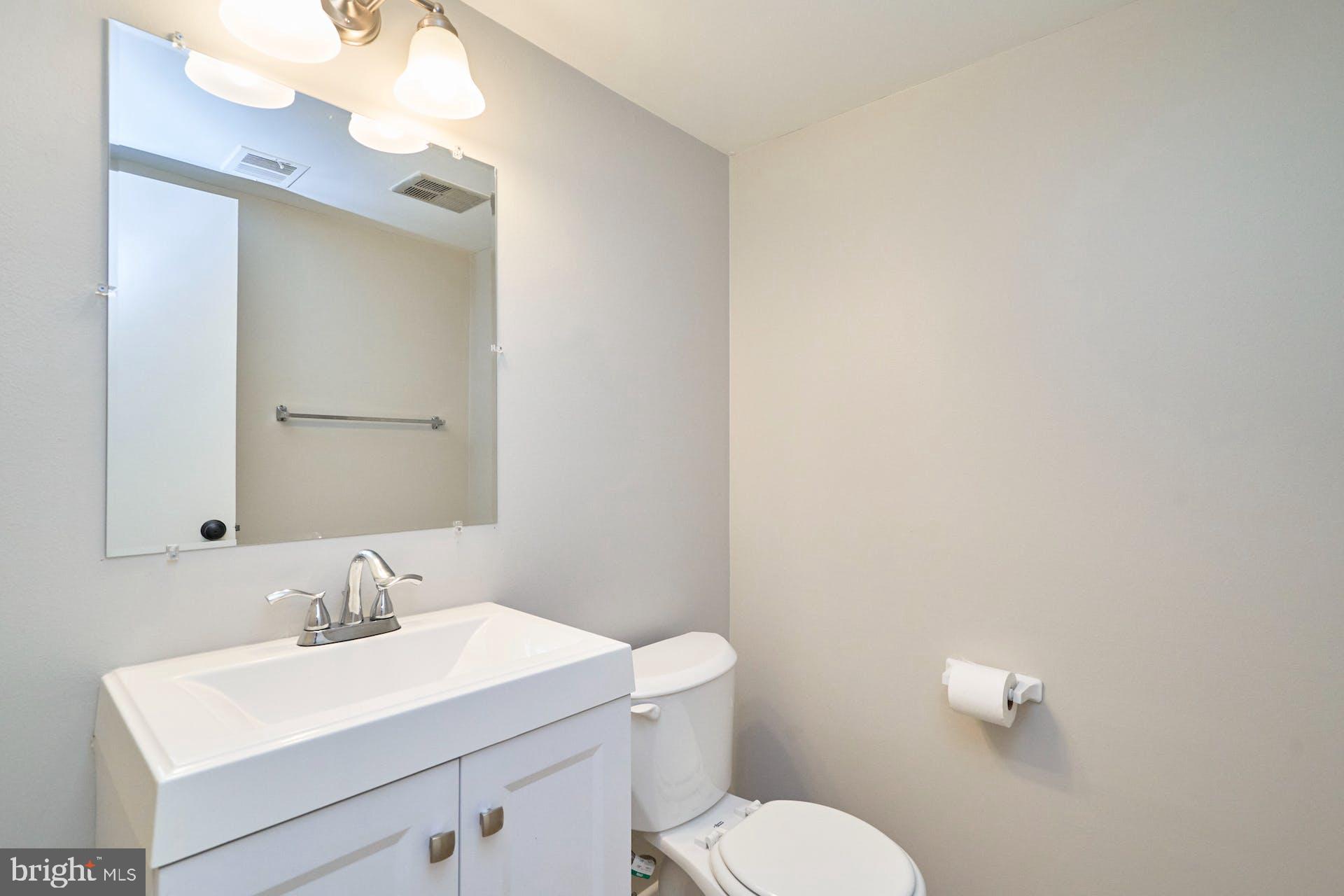 7708 Brandeis Way Springfield, VA 22153 - Photo 16 of 32 Main level 1/2 bath