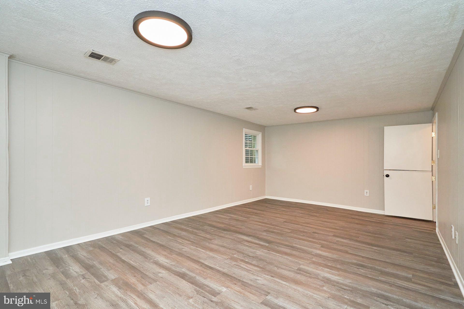 7708 Brandeis Way Springfield, VA 22153 - Photo 22 of 32 Spacious rec room