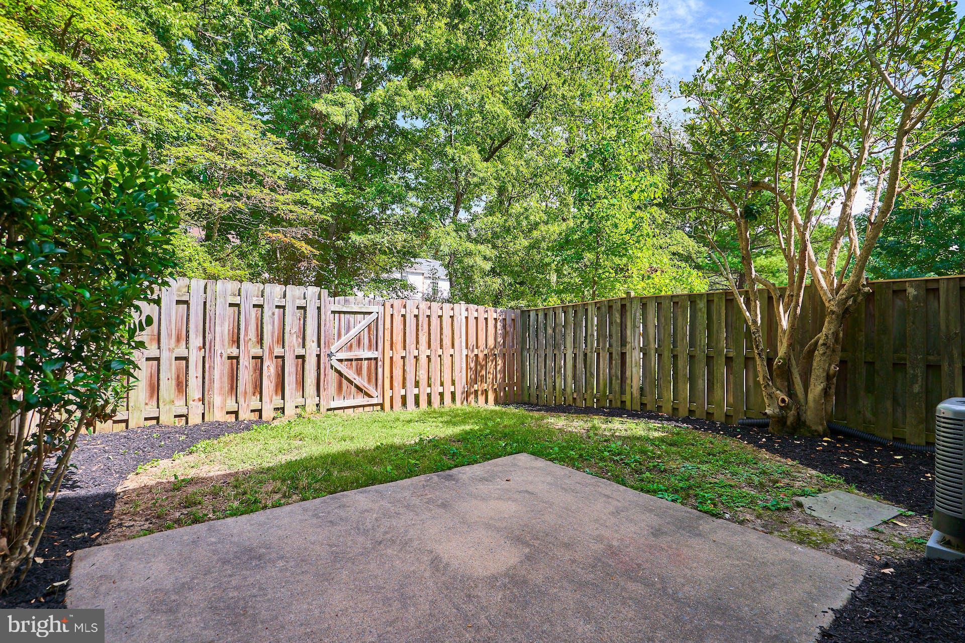 7708 Brandeis Way Springfield, VA 22153 - Photo 28 of 32 Fenced yard and patio