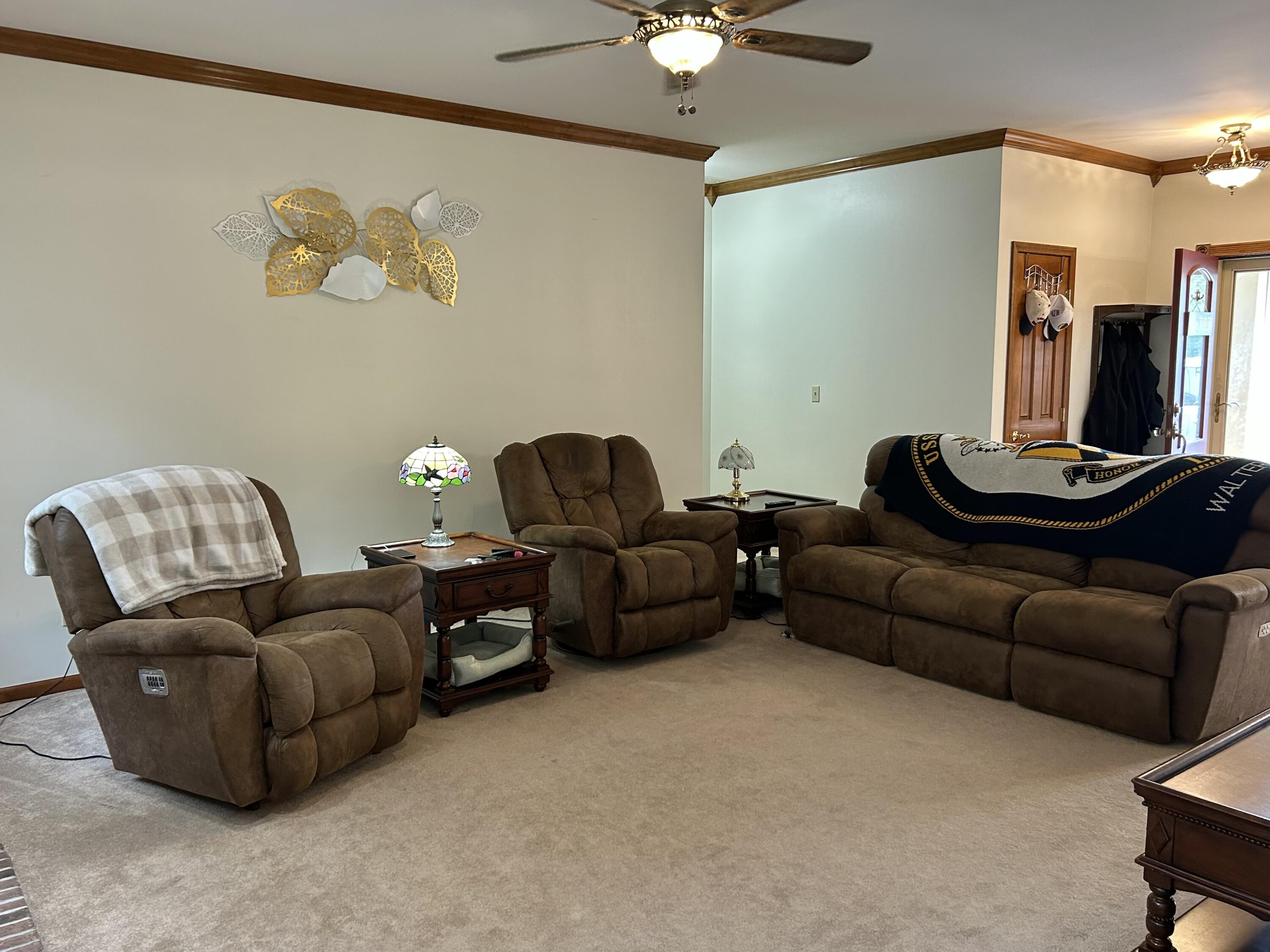 8876 North Lilac Street Demotte, IN 46310 - Photo 9 of 23 a living room with furniture and a couch
