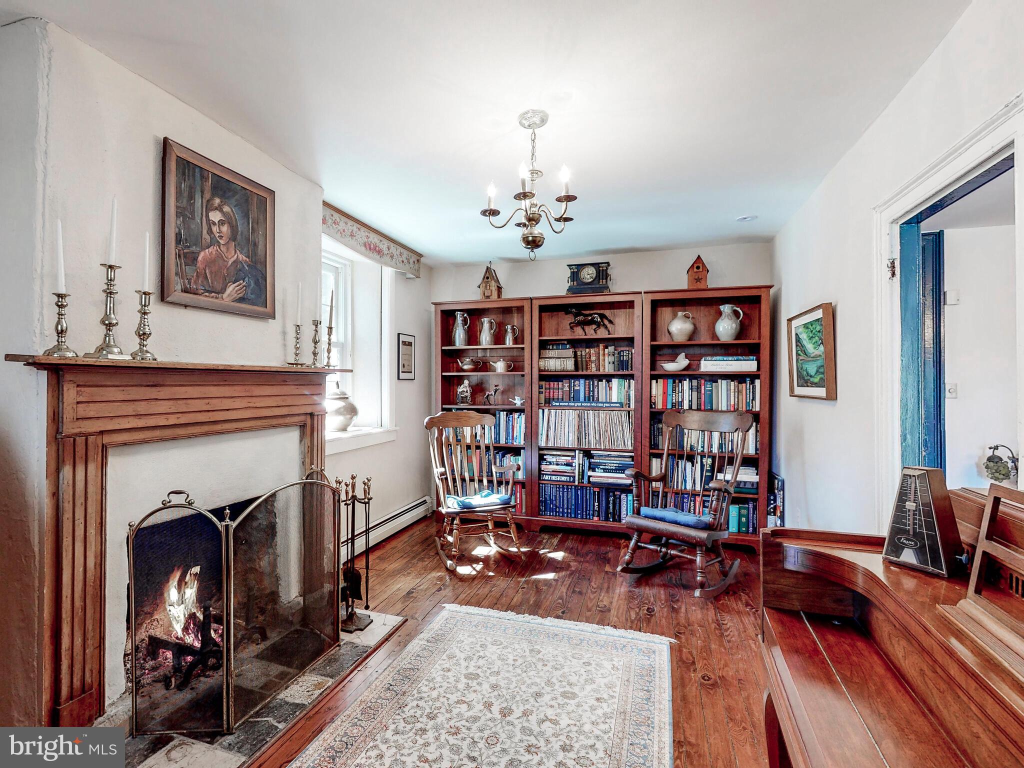 1901 Brighton Dam Road Brookeville, MD 20833 - Photo 27 of 92 Music room with wood-burning fireplace