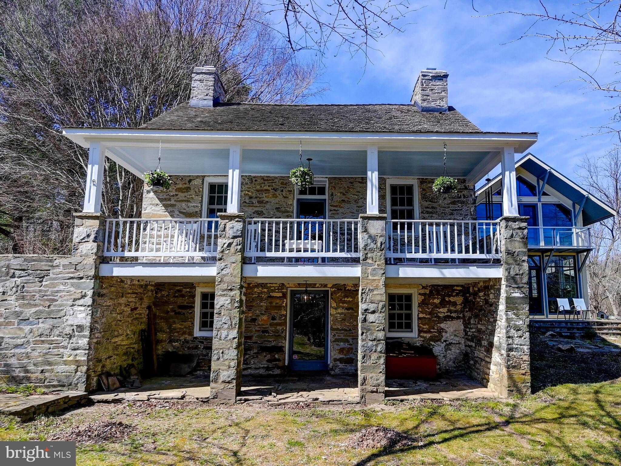 1901 Brighton Dam Road Brookeville, MD 20833 - Photo 55 of 92 Main and lower level covered porches
