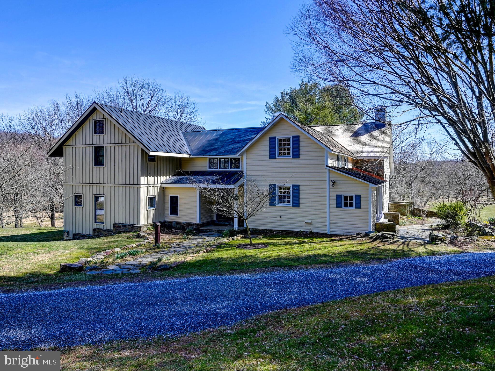 1901 Brighton Dam Road Brookeville, MD 20833 - Photo 69 of 92 Covered porch leads to the inviting entry foyer