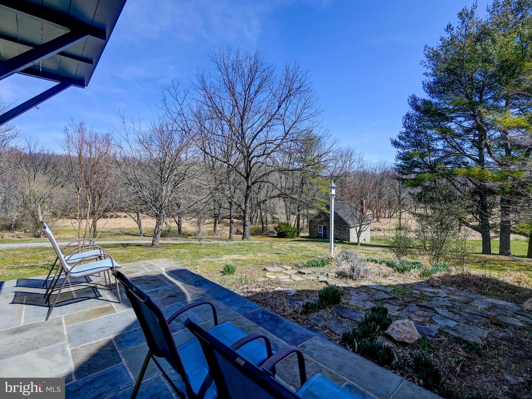1901 Brighton Dam Road Brookeville, MD 20833 - Photo 9 of 92 Stone patio located off of the family room