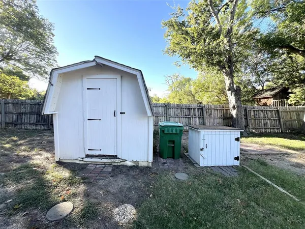 a house view with a backyard space