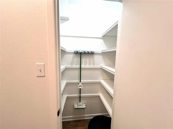 a view of staircase with a rug