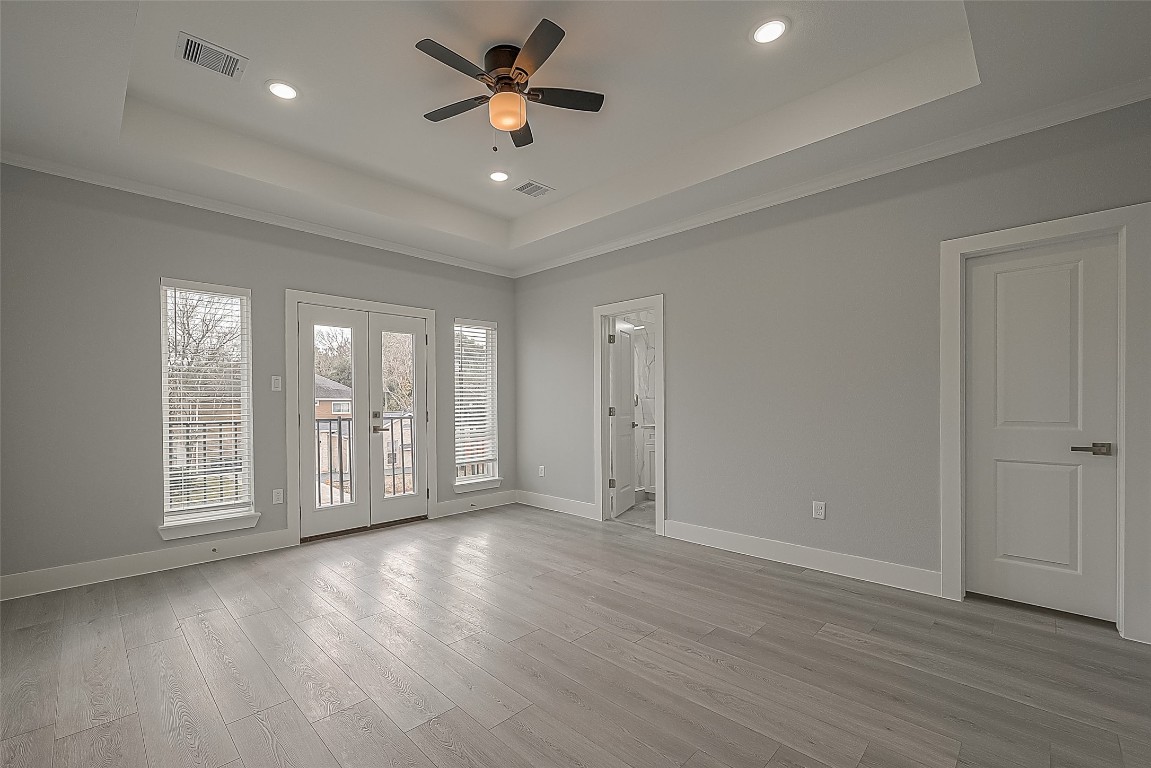 9204 Buffum Street Houston, TX 77051 - Photo 12 of 19 a view of an empty room with a window and wooden floor