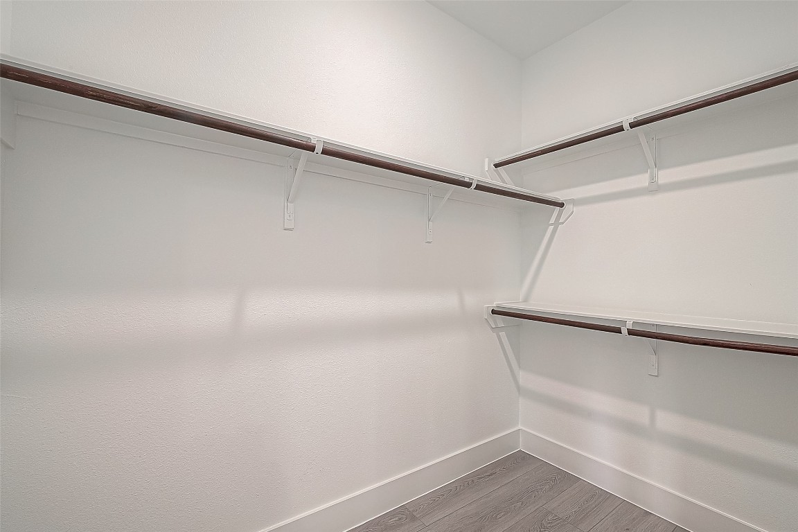 9204 Buffum Street Houston, TX 77051 - Photo 16 of 19 a view of an empty walk in closet