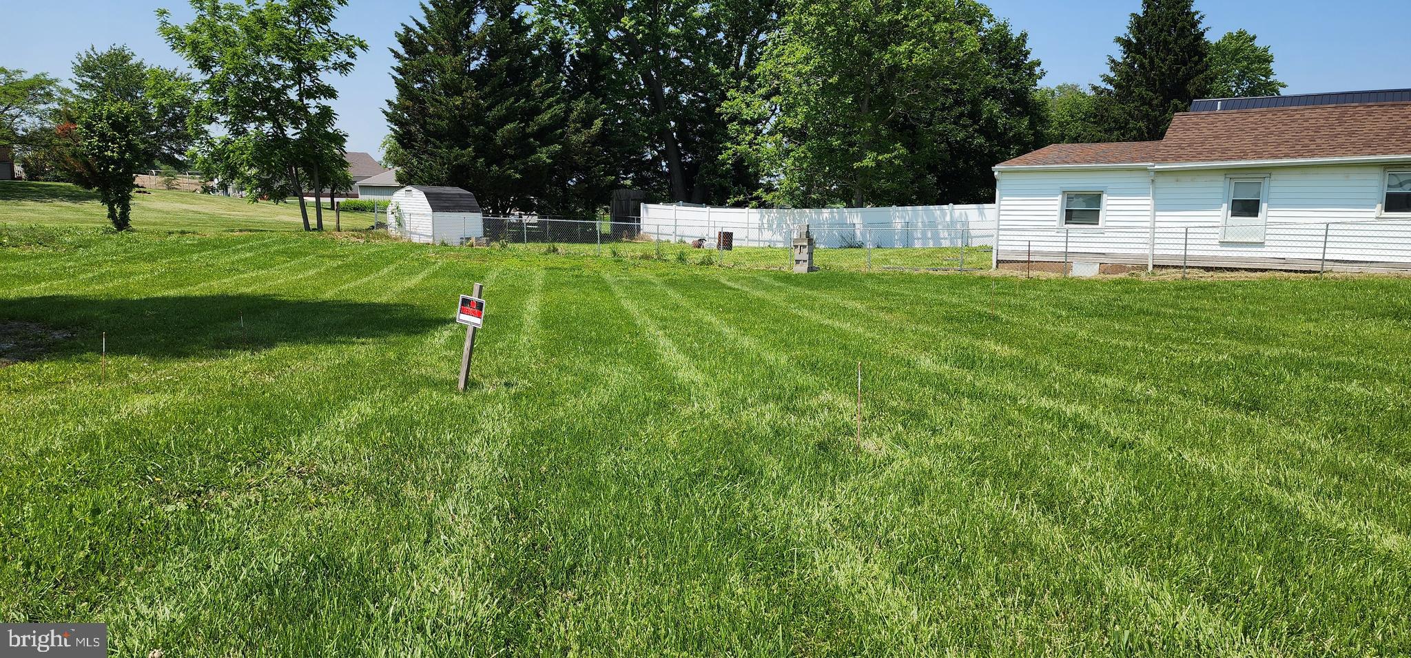 14100 Niswander Road Hagerstown, MD 21740 - Photo 3 of 5 a house view with a sitting space and garden