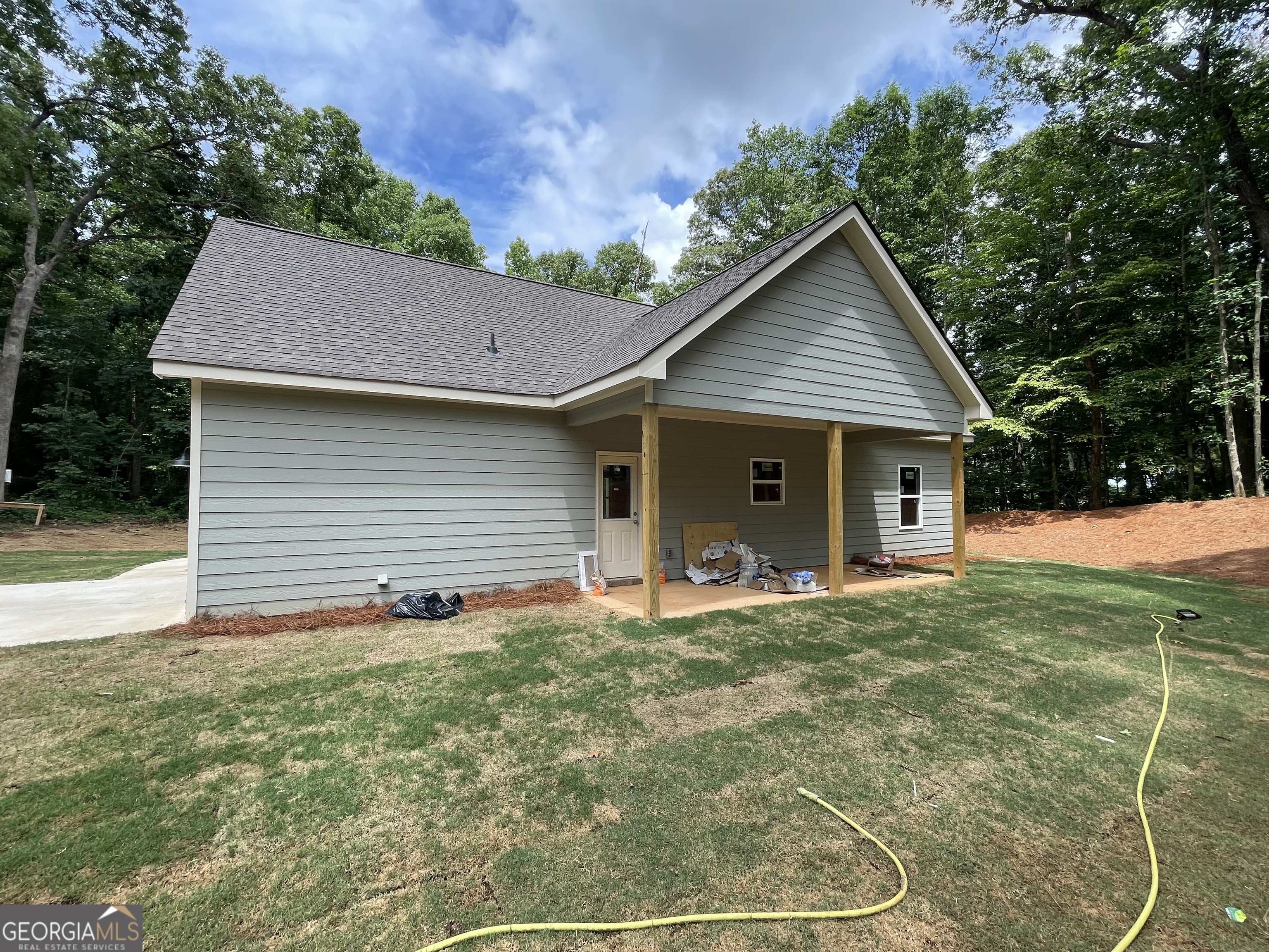 115 Drues Road Bowdon, GA 30108 - Photo 4 of 13 a house view with a garden space
