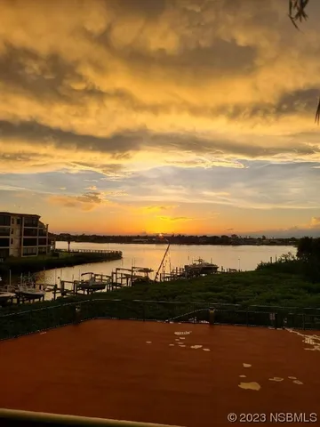 a view of a swimming pool with an ocean view