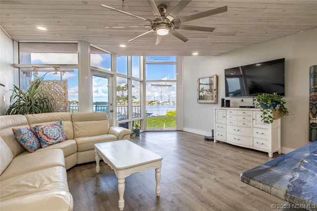a kitchen with sink refrigerator and stove