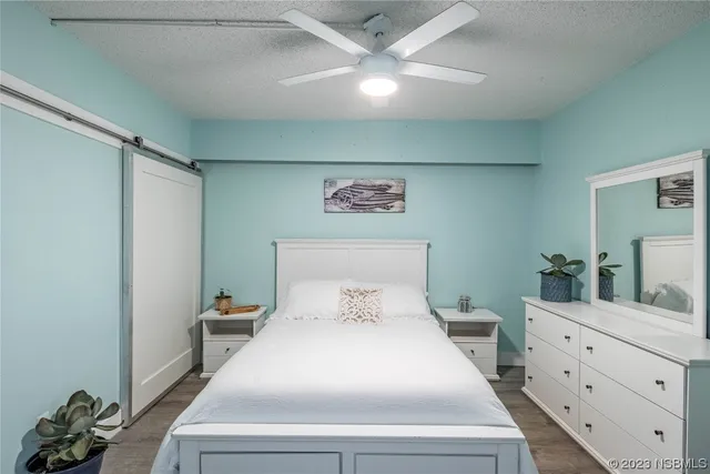 a en suite bathroom with a toilet a sink and shower