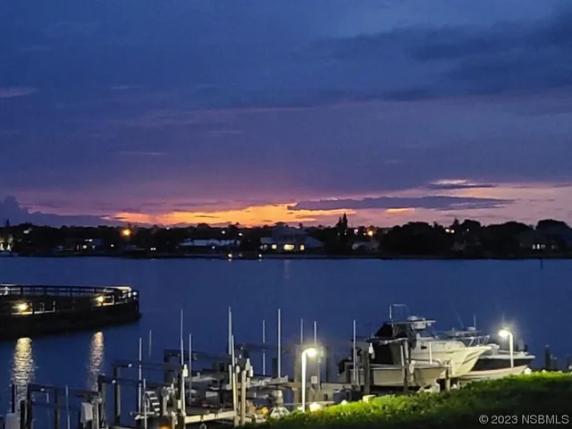 a view of a town with large trees
